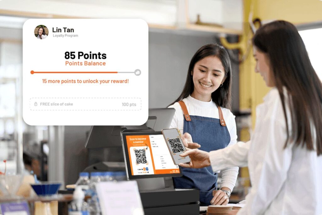 Malaysian customer scanning QR code on a café POS to join StoreHub Loyalty membership program